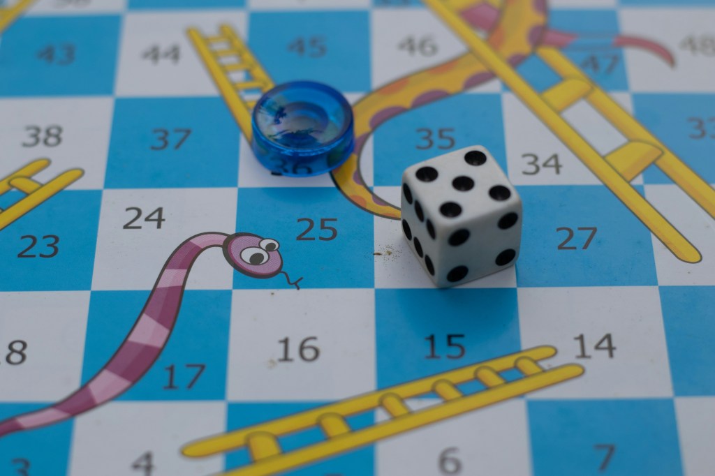 An image of part of the board for the game snakes and ladders